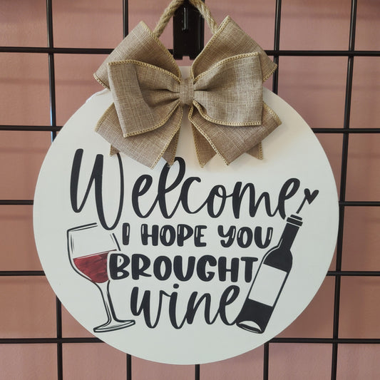 12" "Hope You Brought Wine" door hanger