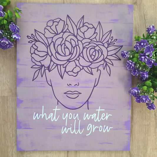 "What You Water Will Grow" wall decor