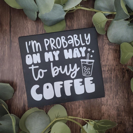 "To Buy Coffee" block sign